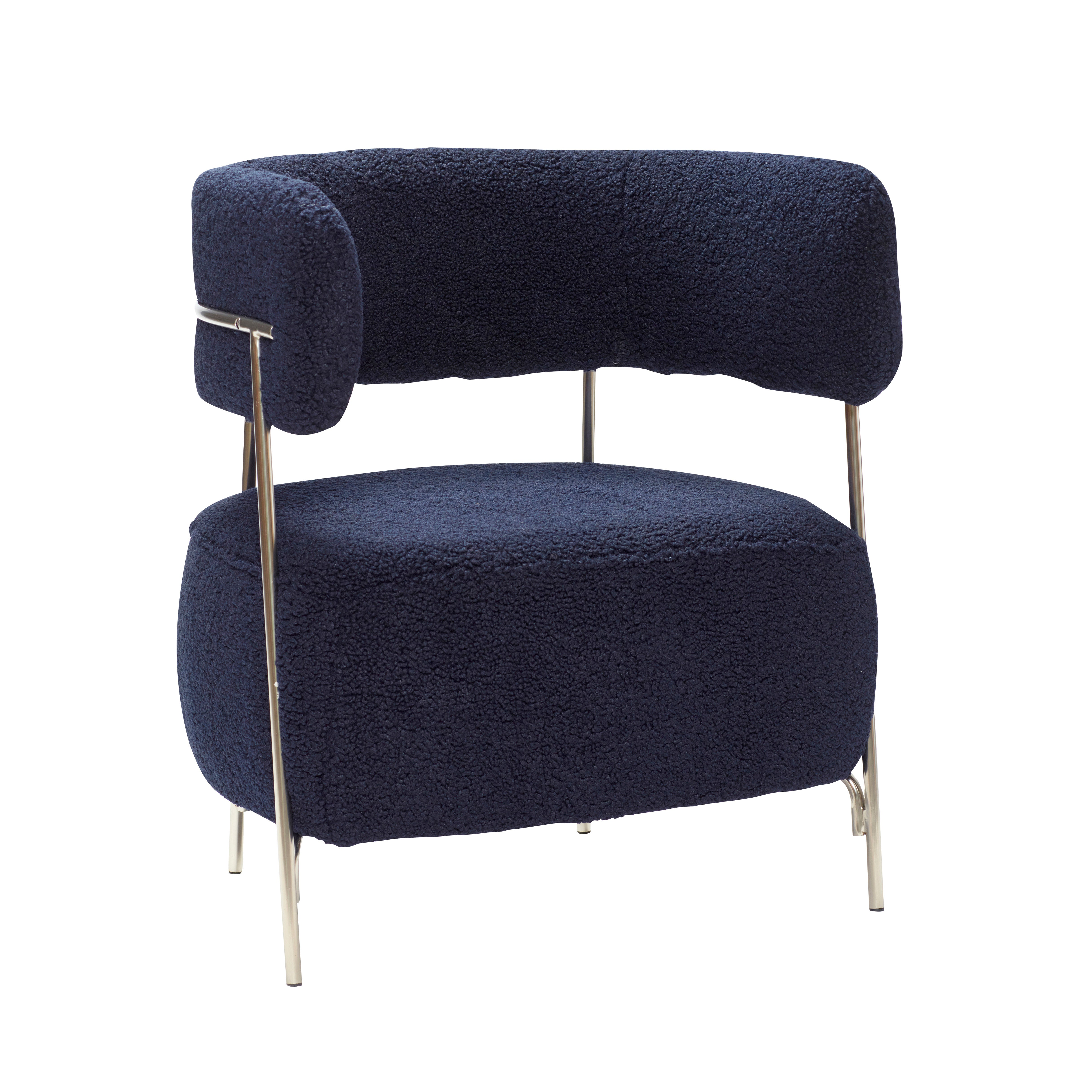 Der Hübsch Teddy Loungestuhl in Blau bietet Komfort und Stil mit seinem modernen Design und robusten Materialien